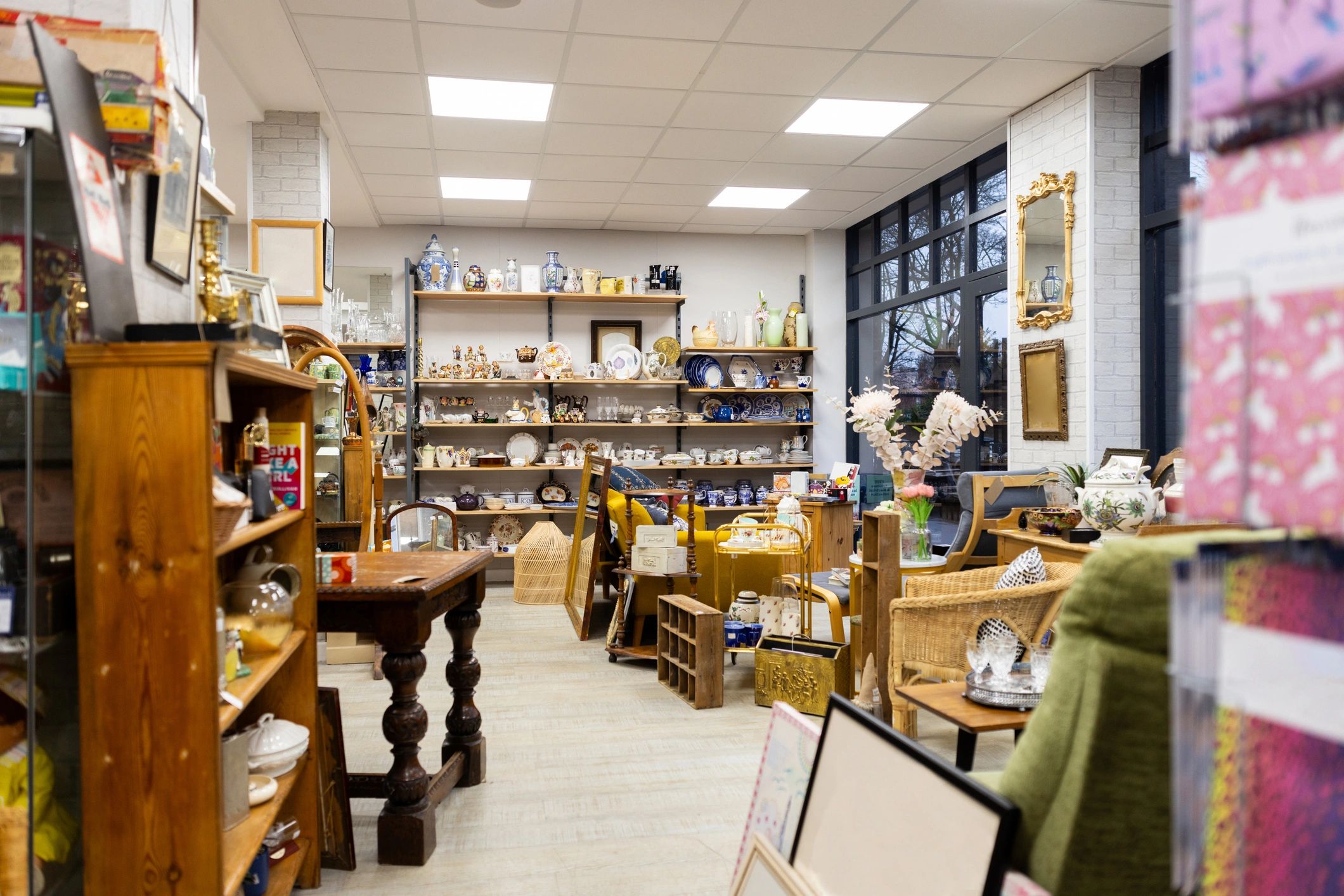 Bright and tidy retail store interior with organized goods on display
